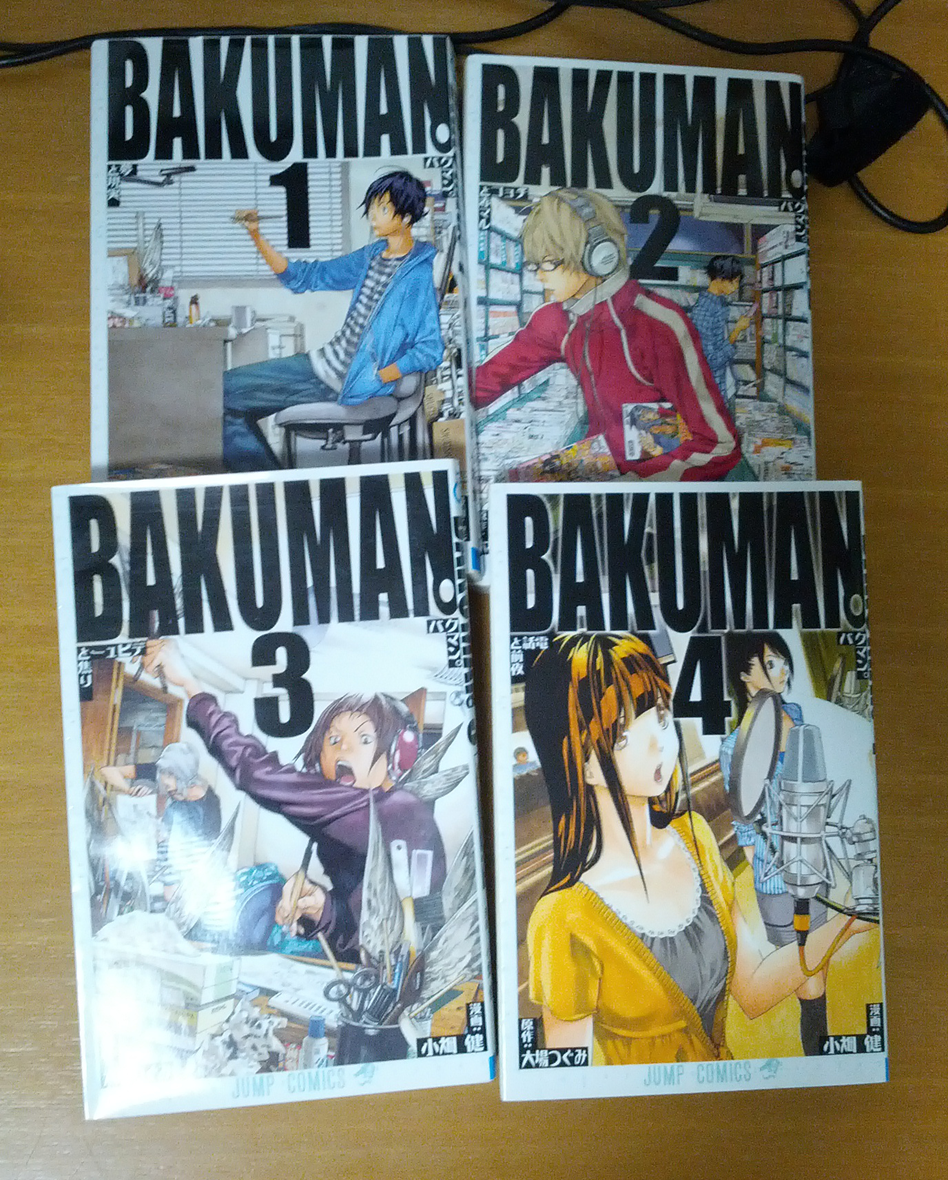 ...und die ersten vier Bände von Bakuman. Kostenfaktor für alles: ca. 6,50€